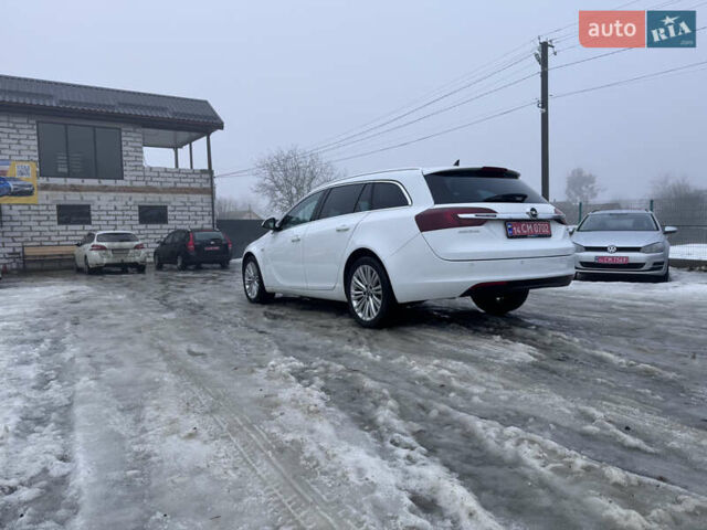 Білий Опель Інсігнія, об'ємом двигуна 2 л та пробігом 230 тис. км за 9600 $, фото 17 на Automoto.ua