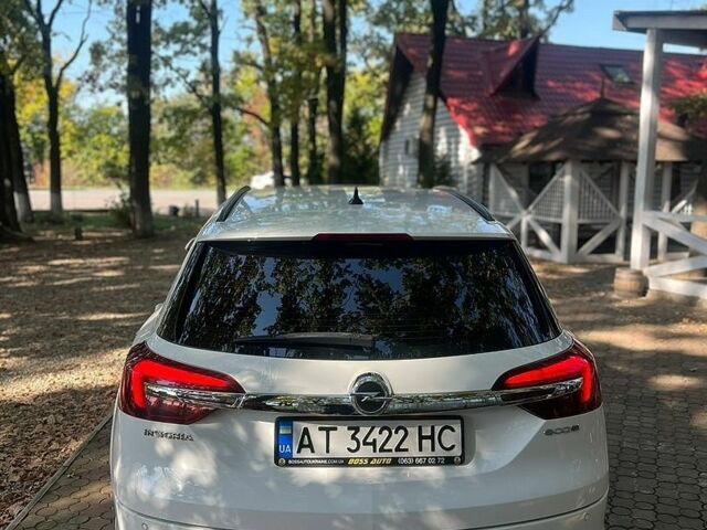 Білий Опель Інсігнія, об'ємом двигуна 2 л та пробігом 265 тис. км за 8200 $, фото 6 на Automoto.ua