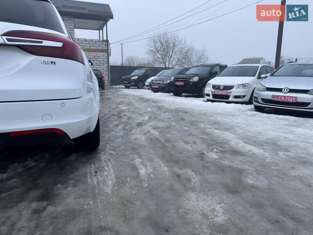 Білий Опель Інсігнія, об'ємом двигуна 2 л та пробігом 230 тис. км за 9600 $, фото 14 на Automoto.ua