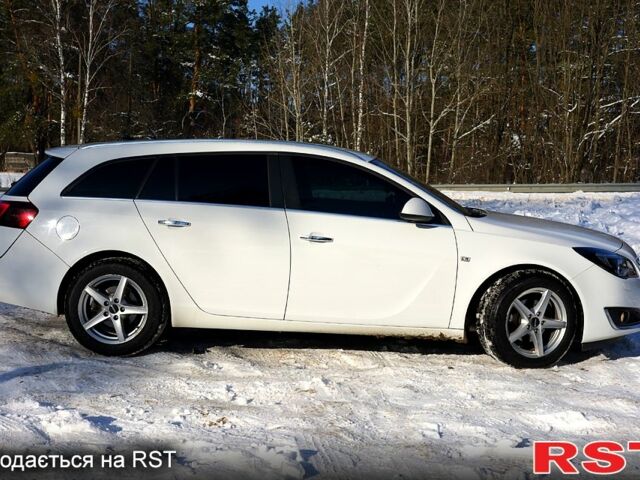 Білий Опель Інсігнія, об'ємом двигуна 2 л та пробігом 315 тис. км за 11200 $, фото 2 на Automoto.ua