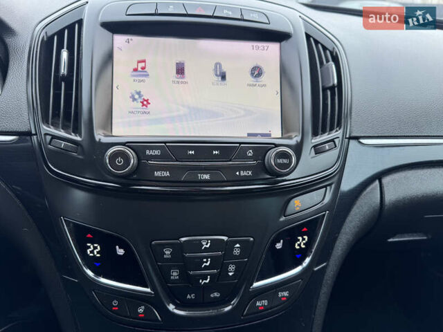 Білий Опель Інсігнія, об'ємом двигуна 2 л та пробігом 230 тис. км за 9600 $, фото 51 на Automoto.ua