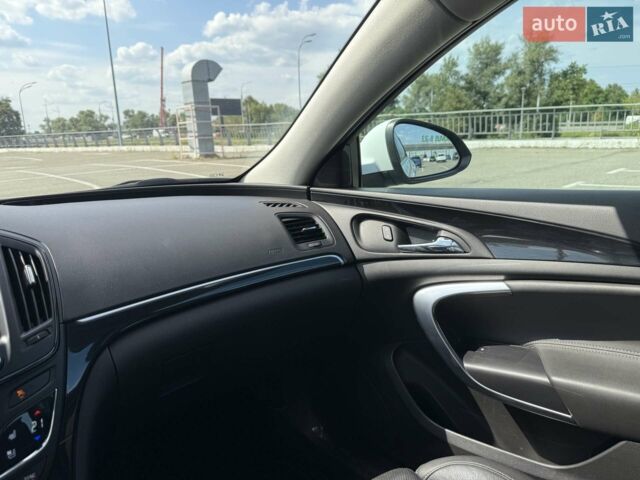 Білий Опель Інсігнія, об'ємом двигуна 1.96 л та пробігом 299 тис. км за 9500 $, фото 12 на Automoto.ua
