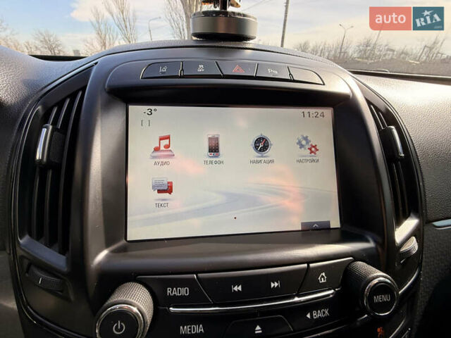 Білий Опель Інсігнія, об'ємом двигуна 2 л та пробігом 221 тис. км за 11600 $, фото 20 на Automoto.ua