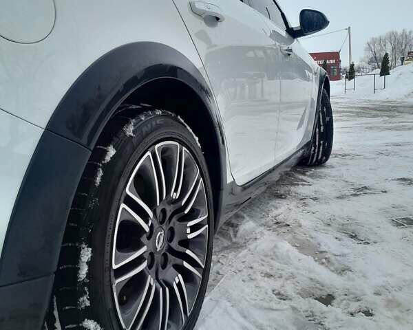 Білий Опель Інсігнія, об'ємом двигуна 1.96 л та пробігом 226 тис. км за 11100 $, фото 9 на Automoto.ua