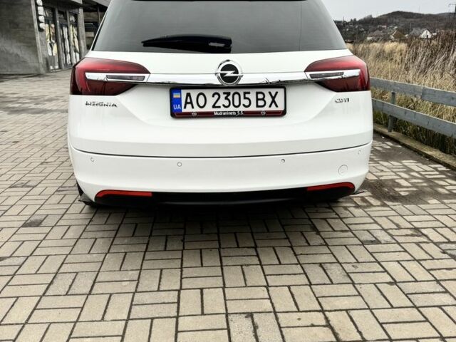 Білий Опель Інсігнія, об'ємом двигуна 2 л та пробігом 279 тис. км за 11700 $, фото 3 на Automoto.ua