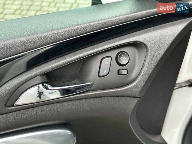 Білий Опель Інсігнія, об'ємом двигуна 2 л та пробігом 198 тис. км за 10490 $, фото 11 на Automoto.ua