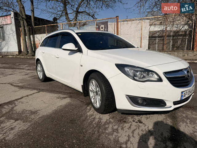 Білий Опель Інсігнія, об'ємом двигуна 2 л та пробігом 221 тис. км за 11600 $, фото 1 на Automoto.ua