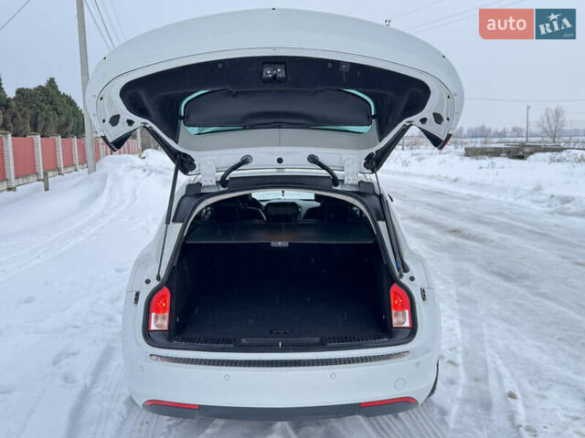 Белый Опель Инсигния, объемом двигателя 2 л и пробегом 248 тыс. км за 10650 $, фото 30 на Automoto.ua