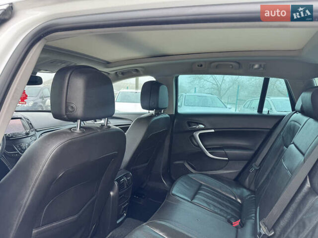 Білий Опель Інсігнія, об'ємом двигуна 2 л та пробігом 230 тис. км за 9600 $, фото 27 на Automoto.ua