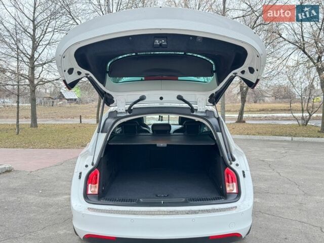 Белый Опель Инсигния, объемом двигателя 2 л и пробегом 248 тыс. км за 11200 $, фото 19 на Automoto.ua