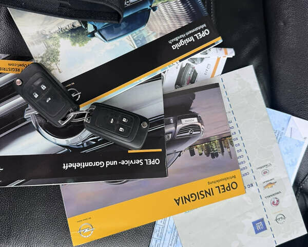 Білий Опель Інсігнія, об'ємом двигуна 2 л та пробігом 230 тис. км за 9600 $, фото 50 на Automoto.ua