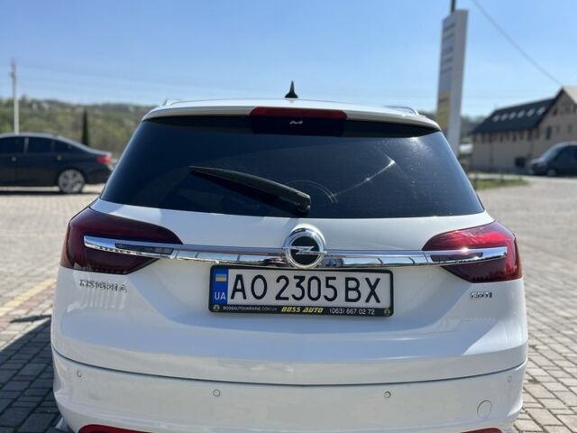 Білий Опель Інсігнія, об'ємом двигуна 2 л та пробігом 293 тис. км за 11500 $, фото 4 на Automoto.ua