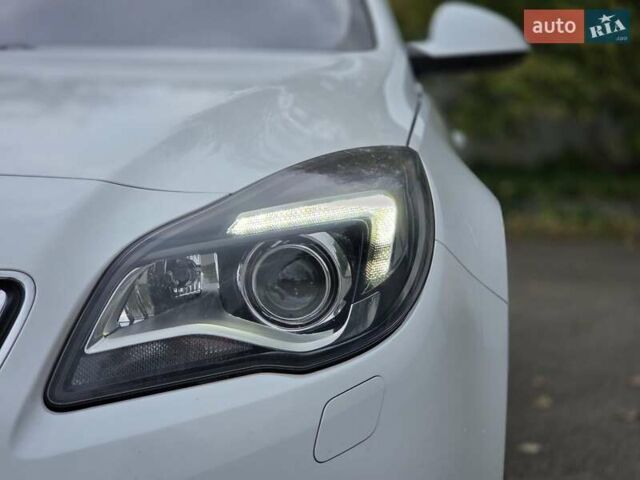 Білий Опель Інсігнія, об'ємом двигуна 1.6 л та пробігом 211 тис. км за 9999 $, фото 4 на Automoto.ua