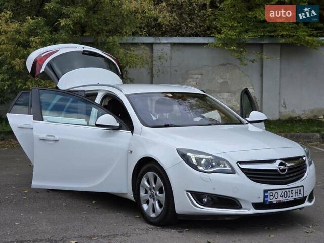 Білий Опель Інсігнія, об'ємом двигуна 1.6 л та пробігом 211 тис. км за 9999 $, фото 18 на Automoto.ua