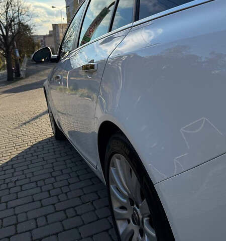 Белый Опель Инсигния, объемом двигателя 1.6 л и пробегом 234 тыс. км за 11600 $, фото 7 на Automoto.ua