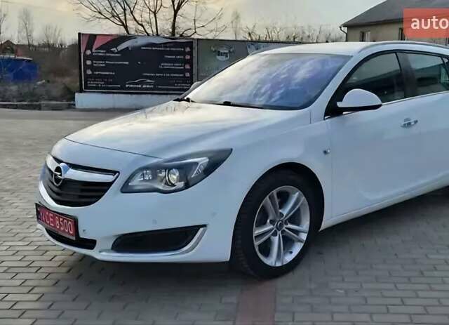 Білий Опель Інсігнія, об'ємом двигуна 1.96 л та пробігом 252 тис. км за 14200 $, фото 4 на Automoto.ua