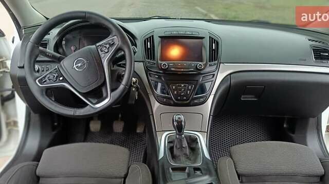 Білий Опель Інсігнія, об'ємом двигуна 1.6 л та пробігом 227 тис. км за 9500 $, фото 11 на Automoto.ua