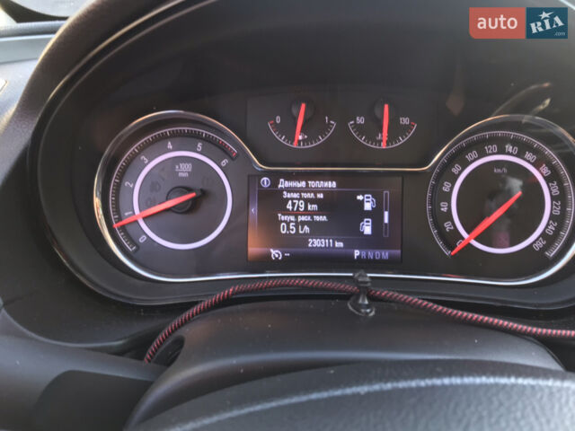 Білий Опель Інсігнія, об'ємом двигуна 1.6 л та пробігом 230 тис. км за 12800 $, фото 8 на Automoto.ua
