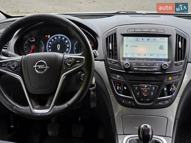 Білий Опель Інсігнія, об'ємом двигуна 1.6 л та пробігом 211 тис. км за 9999 $, фото 22 на Automoto.ua