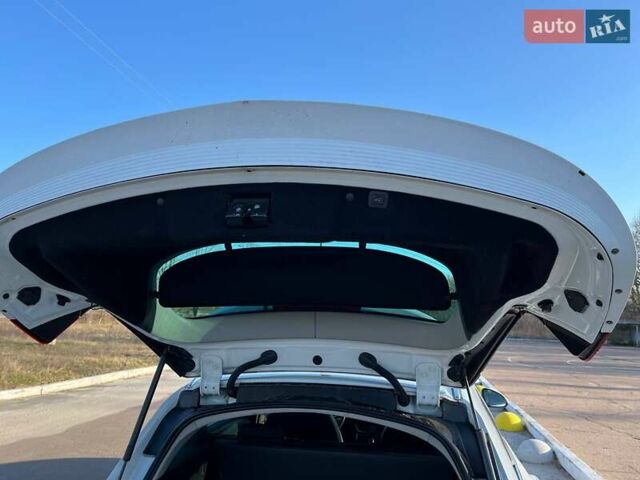 Белый Опель Инсигния, объемом двигателя 1.96 л и пробегом 258 тыс. км за 9600 $, фото 10 на Automoto.ua