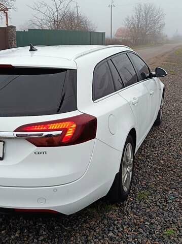 Білий Опель Інсігнія, об'ємом двигуна 1.6 л та пробігом 227 тис. км за 9500 $, фото 2 на Automoto.ua