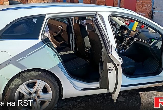 Белый Опель Инсигния, объемом двигателя 1.6 л и пробегом 234 тыс. км за 10750 $, фото 8 на Automoto.ua