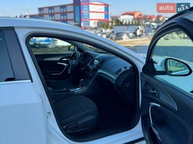 Білий Опель Інсігнія, об'ємом двигуна 1.6 л та пробігом 288 тис. км за 7750 $, фото 10 на Automoto.ua