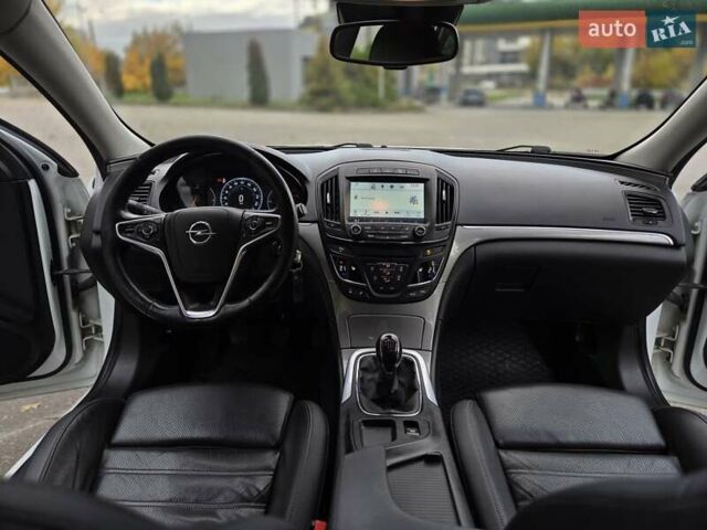 Білий Опель Інсігнія, об'ємом двигуна 1.6 л та пробігом 211 тис. км за 9999 $, фото 25 на Automoto.ua