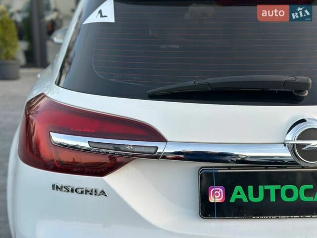 Белый Опель Инсигния, объемом двигателя 1.96 л и пробегом 256 тыс. км за 11990 $, фото 6 на Automoto.ua