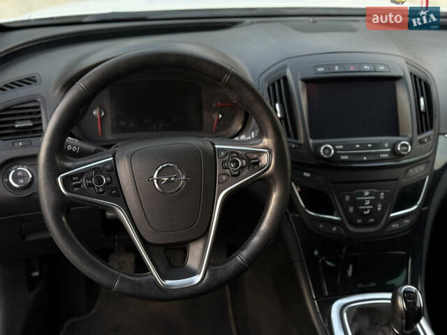 Белый Опель Инсигния, объемом двигателя 2 л и пробегом 340 тыс. км за 9600 $, фото 7 на Automoto.ua