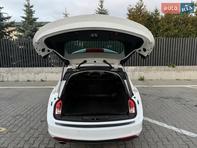 Белый Опель Инсигния, объемом двигателя 2 л и пробегом 340 тыс. км за 9600 $, фото 24 на Automoto.ua