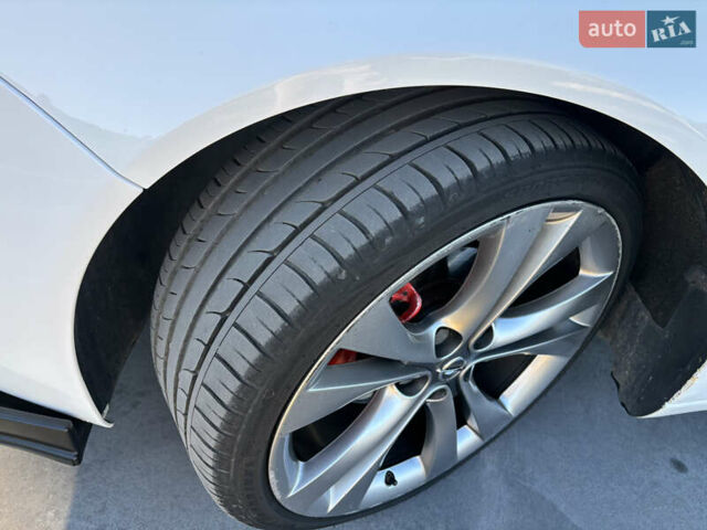 Білий Опель Інсігнія, об'ємом двигуна 1.6 л та пробігом 235 тис. км за 11550 $, фото 9 на Automoto.ua