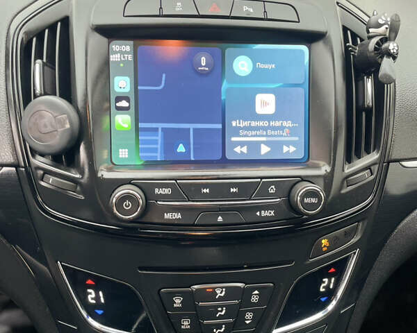 Белый Опель Инсигния, объемом двигателя 1.6 л и пробегом 214 тыс. км за 11300 $, фото 9 на Automoto.ua