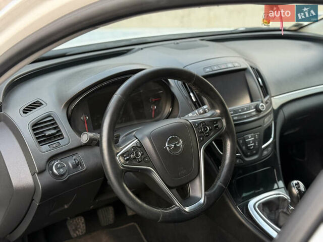 Белый Опель Инсигния, объемом двигателя 2 л и пробегом 340 тыс. км за 9600 $, фото 26 на Automoto.ua