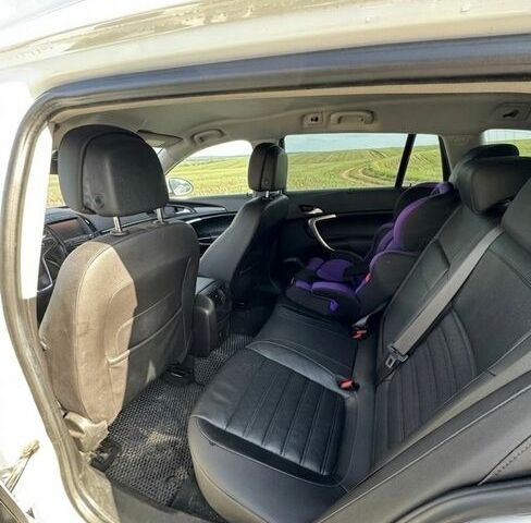 Білий Опель Інсігнія, об'ємом двигуна 1.96 л та пробігом 192 тис. км за 15000 $, фото 5 на Automoto.ua