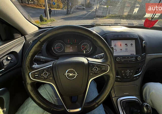 Белый Опель Инсигния, объемом двигателя 1.6 л и пробегом 234 тыс. км за 11600 $, фото 5 на Automoto.ua