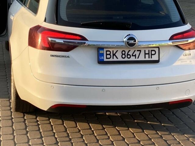 Білий Опель Інсігнія, об'ємом двигуна 1.6 л та пробігом 208 тис. км за 8600 $, фото 4 на Automoto.ua