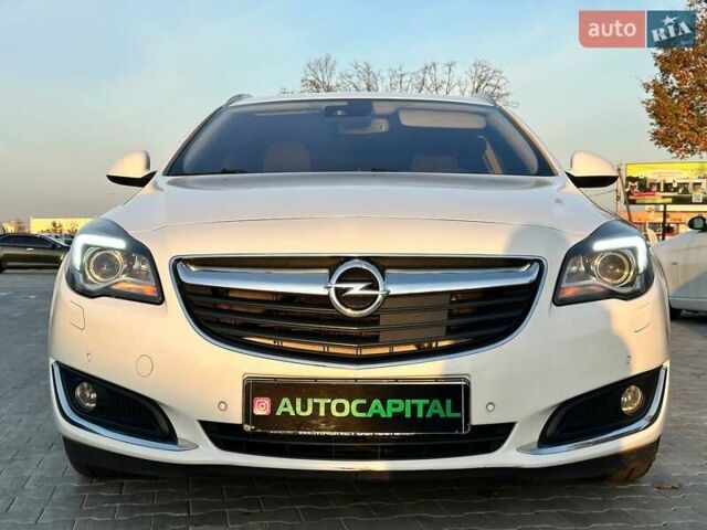 Белый Опель Инсигния, объемом двигателя 1.96 л и пробегом 256 тыс. км за 12500 $, фото 2 на Automoto.ua