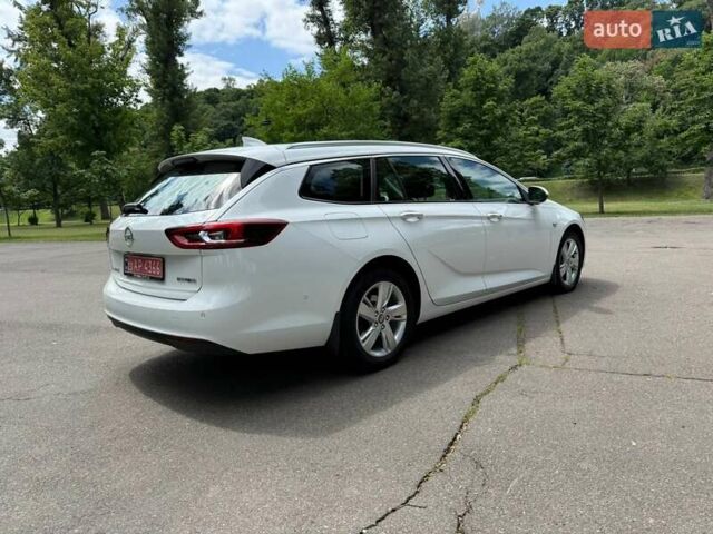 Белый Опель Инсигния, объемом двигателя 1.6 л и пробегом 190 тыс. км за 11350 $, фото 4 на Automoto.ua
