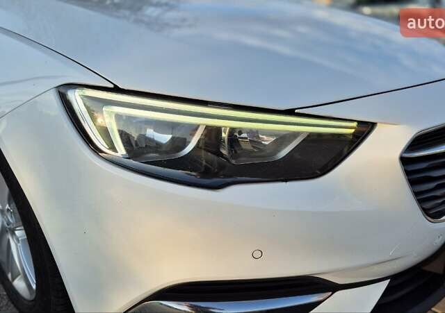 Белый Опель Инсигния, объемом двигателя 1.96 л и пробегом 170 тыс. км за 15200 $, фото 1 на Automoto.ua