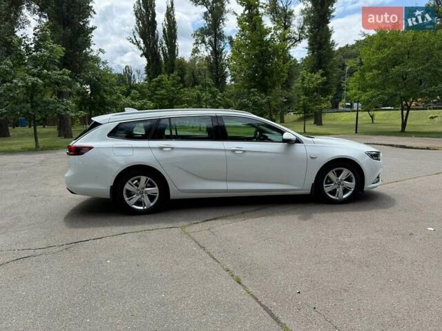 Белый Опель Инсигния, объемом двигателя 1.6 л и пробегом 190 тыс. км за 11350 $, фото 5 на Automoto.ua