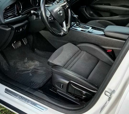 Білий Опель Інсігнія, об'ємом двигуна 1.96 л та пробігом 223 тис. км за 13900 $, фото 10 на Automoto.ua