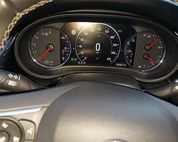 Белый Опель Инсигния, объемом двигателя 2 л и пробегом 217 тыс. км за 13500 $, фото 3 на Automoto.ua
