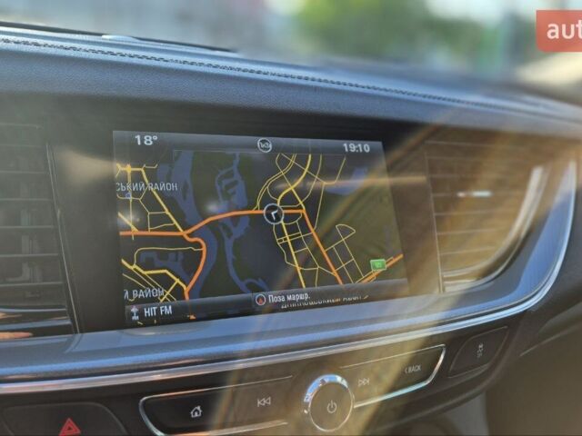 Білий Опель Інсігнія, об'ємом двигуна 1.96 л та пробігом 190 тис. км за 13000 $, фото 16 на Automoto.ua