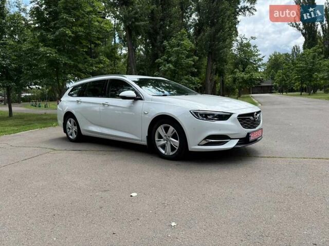 Белый Опель Инсигния, объемом двигателя 1.6 л и пробегом 190 тыс. км за 11350 $, фото 6 на Automoto.ua