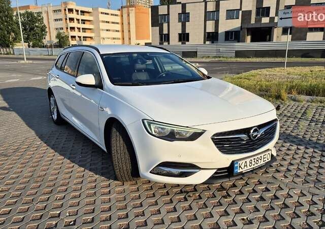 Белый Опель Инсигния, объемом двигателя 1.96 л и пробегом 170 тыс. км за 15200 $, фото 2 на Automoto.ua