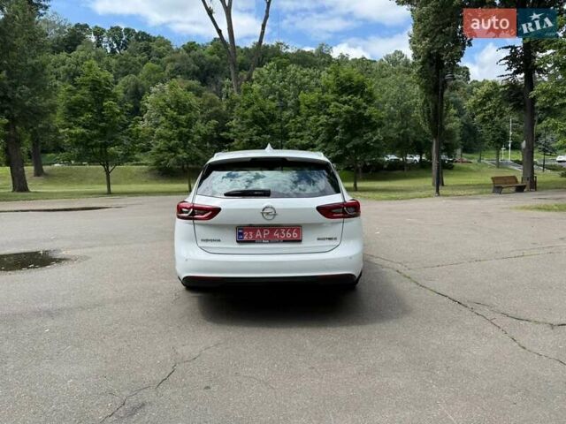 Белый Опель Инсигния, объемом двигателя 1.6 л и пробегом 190 тыс. км за 11350 $, фото 3 на Automoto.ua
