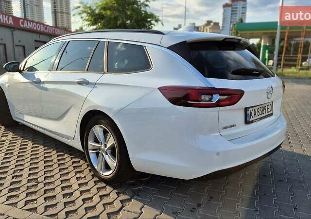 Белый Опель Инсигния, объемом двигателя 1.96 л и пробегом 170 тыс. км за 15200 $, фото 4 на Automoto.ua