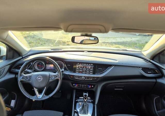 Белый Опель Инсигния, объемом двигателя 1.96 л и пробегом 170 тыс. км за 15200 $, фото 14 на Automoto.ua