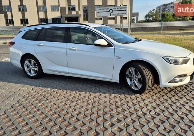 Белый Опель Инсигния, объемом двигателя 1.96 л и пробегом 170 тыс. км за 15200 $, фото 3 на Automoto.ua